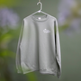 Sweat-shirt Great Garden Plants accroché à un cintre
